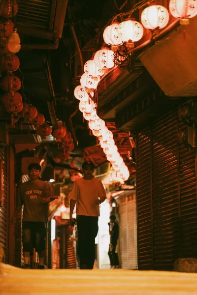 Lantern-lit alley in Jiufen at night after the shops have closed